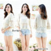 Women embroidered cotton lace blouse with sheer floral texture and relaxed summer boutique styling.