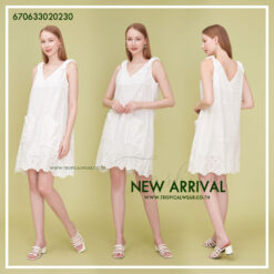 Casual embroidered mini dress in white, perfect for summer outings.