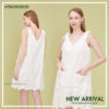 Casual embroidered mini dress in white, perfect for summer outings.