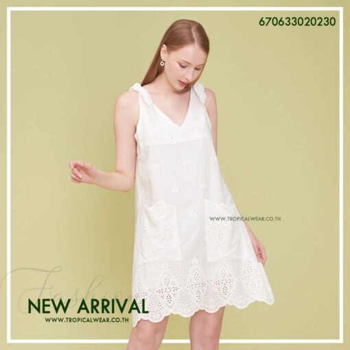 Casual embroidered mini dress in white, perfect for summer outings.