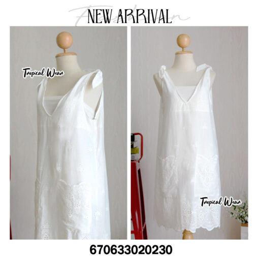 Casual embroidered mini dress in white, perfect for summer outings.