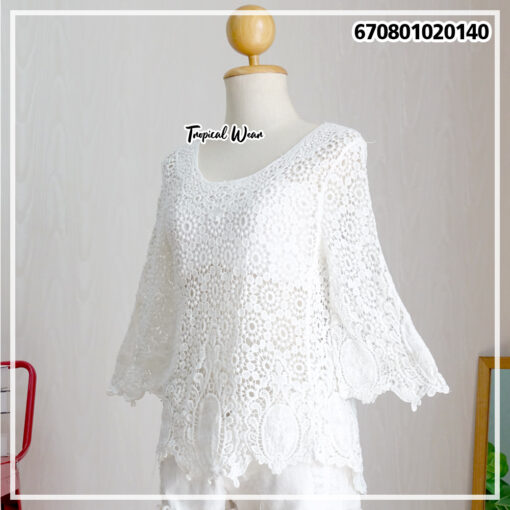 Boho lace tops in soft ivory and white, perfect for casual wear with a touch of elegance.