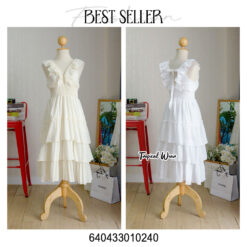 White summer sundress with ruffles and tiered layers for a chic look