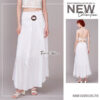 White resort cotton maxi skirt women style with flowing layered hem, elastic waist, and feminine summer resortwear silhouette.