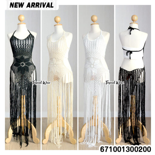 Handmade crochet beach cover-up dress with intricate boho patterns and fringes.