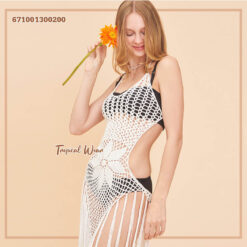 Handmade crochet beach cover-up dress with intricate boho patterns and fringes.