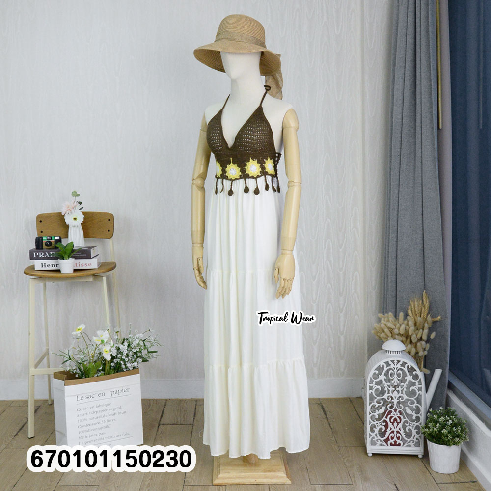 Handmade crochet bustier halter maxi dress with an adjustable back tie and flowing skirt