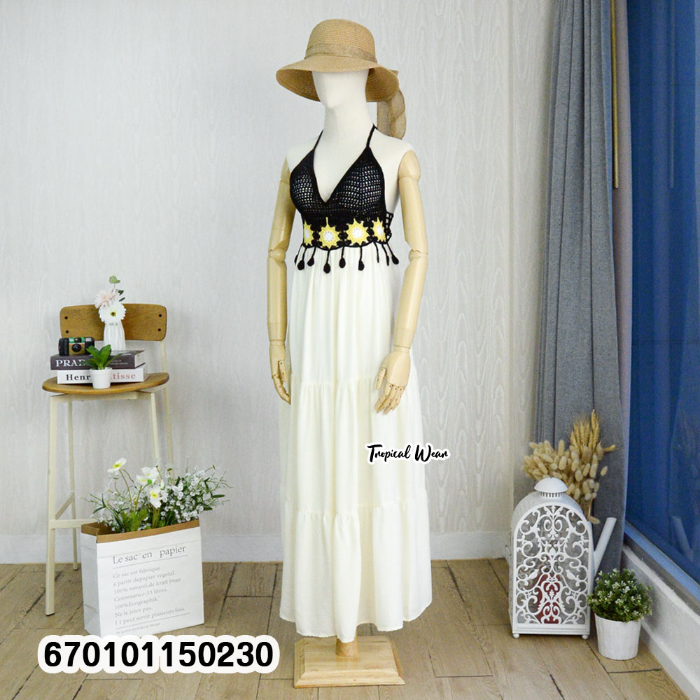 Handmade crochet bustier halter maxi dress with an adjustable back tie and flowing skirt