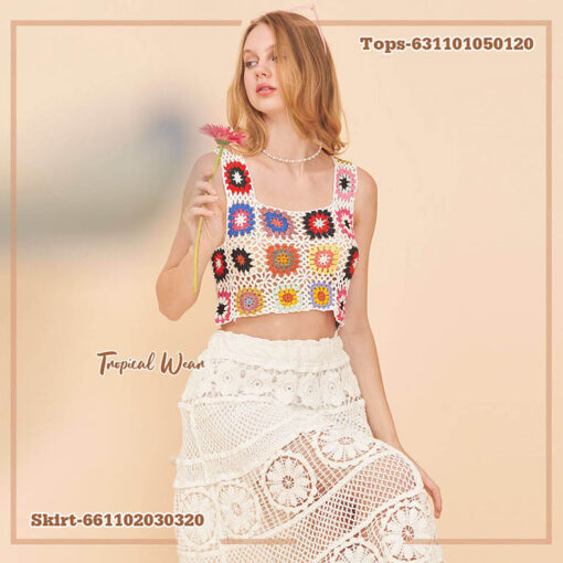 A handmade crochet crop top with colorful granny square patterns, perfect for boho fashion lovers.