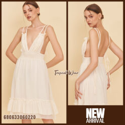 sleeveless white and cream cotton sundresses displayed with ruffle hem