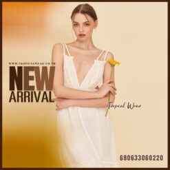 sleeveless white and cream cotton sundresses displayed with ruffle hem