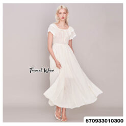 Romantic white off-shoulder maxi dress with ruffle sleeves.