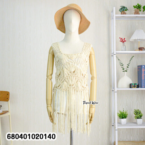 Macramé-style crochet tank top with fringe detailing, shown in white and beige.