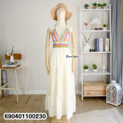 Maxi dress with handmade crochet bralette top and flowing layered skirt.