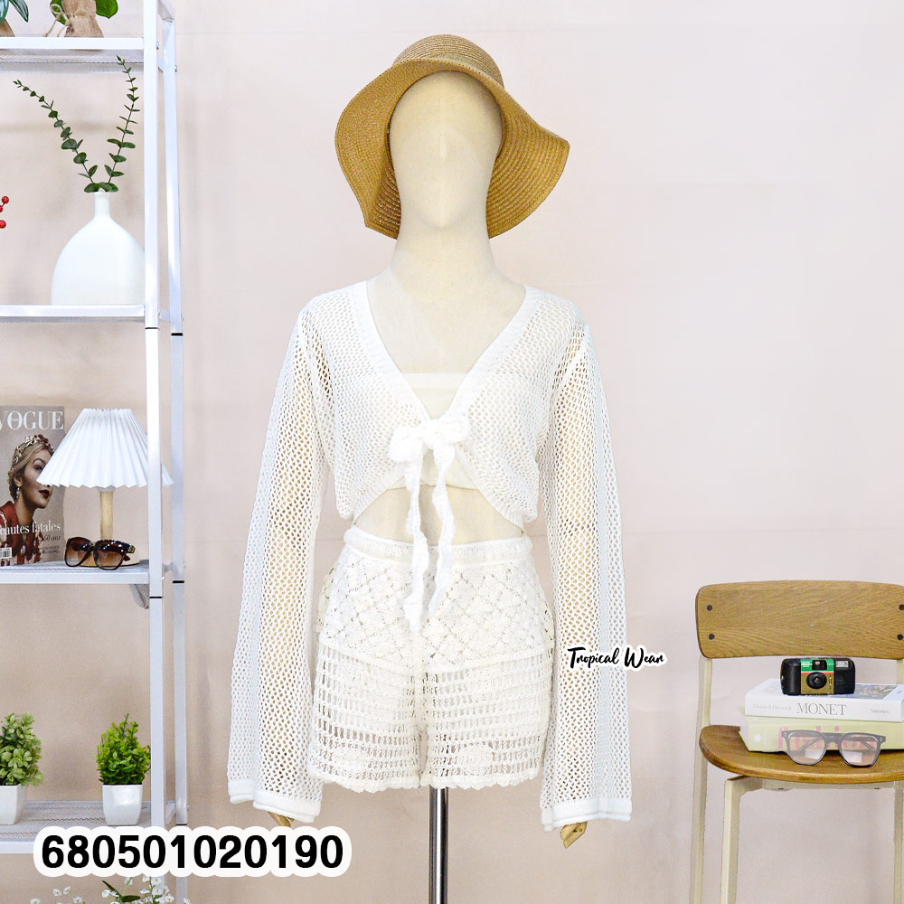 Black long sleeve mesh knit cover-up made of breathable cotton, featuring an open front with tie detail—perfect for layering over beachwear.