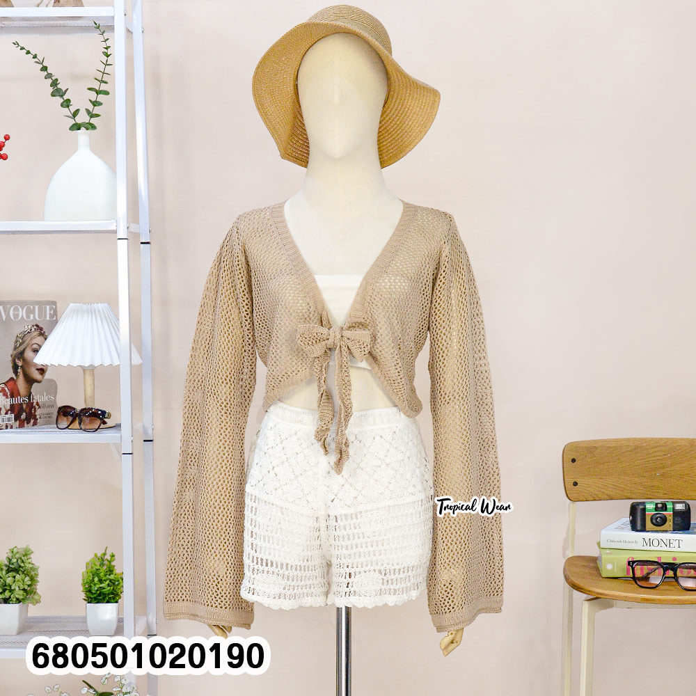 Black long sleeve mesh knit cover-up made of breathable cotton, featuring an open front with tie detail—perfect for layering over beachwear.