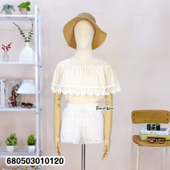 White off shoulder cotton crop top with lace detailing shown on mannequin
