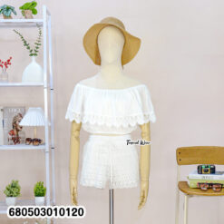 White off shoulder cotton crop top with lace detailing shown on mannequin