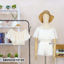 White off shoulder cotton crop top with lace detailing shown on mannequin