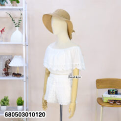 White off shoulder cotton crop top with lace detailing shown on mannequin