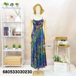 Cotton maxi dress in colorful tie dye, perfect for hot-weather styling.