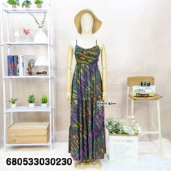 Cotton maxi dress in colorful tie dye, perfect for hot-weather styling.