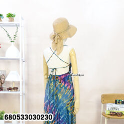 Cotton maxi dress in colorful tie dye, perfect for hot-weather styling.