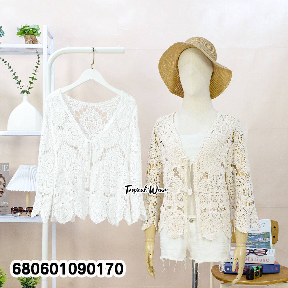 A free size cotton lace cardigan styled for summer wear, seen on a mannequin.