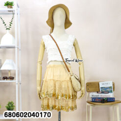 Layered sequin skirt with inner shorts, stylish and chic for parties.