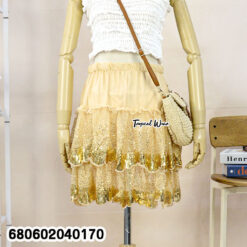 Layered sequin skirt with inner shorts, stylish and chic for parties.