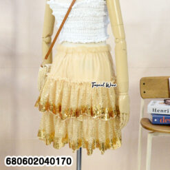 Layered sequin skirt with inner shorts, stylish and chic for parties.