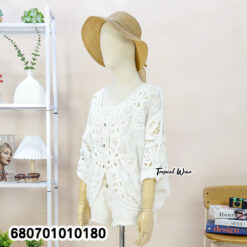 Loose-fit cotton cardigan with button front and floral lace, styled for casual wear
