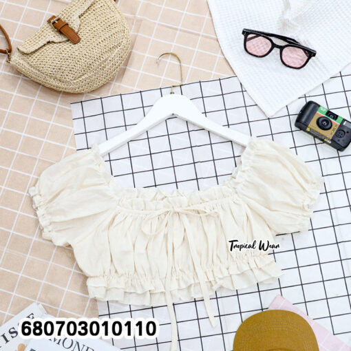 Off shoulder white cotton crop top with puff sleeves and ruffle hem – flatlay display