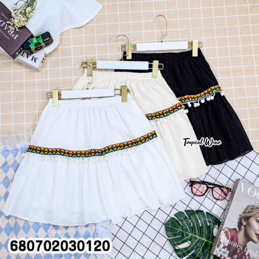 Free-size cotton mini skirt with colorful boho trim, designed for comfortable everyday wear.