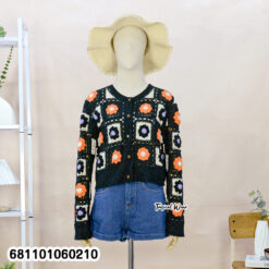 “Women’s free-size crochet cardigan with floral square design, soft warm yarn material, long sleeves, ideal for cool and gusty weather.”