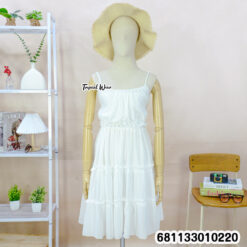 Free size white cotton sundress with adjustable straps and ruffle tiers for wholesale.