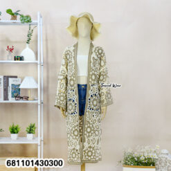 Crochet look cover-up styled casually for beach and city wear