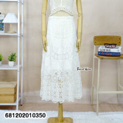 Flowing romantic lace skirt with layered details styled for summer