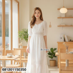 White cotton eyelet maxi dress with puff sleeves and elastic waist