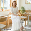 White cotton eyelet maxi dress with puff sleeves and elastic waist