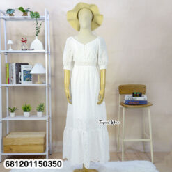 White cotton eyelet maxi dress with puff sleeves and elastic waist