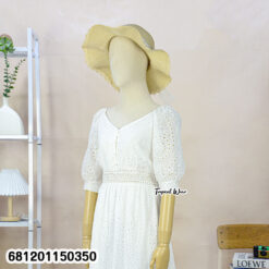 White cotton eyelet maxi dress with puff sleeves and elastic waist