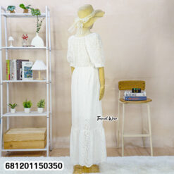 White cotton eyelet maxi dress with puff sleeves and elastic waist
