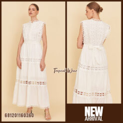 Elegant white lace maxi dress with sleeveless design and waist tie, styled for summer resort fashion.