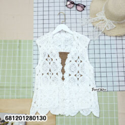 Beige crochet sleeveless boho vest styled for summer resort look