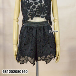 White nylon lace beach shorts styled for tropical resort look