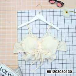 Wholesale boho ruffle bralette crop tops in white and cream with adjustable straps for beach boutique collections