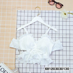 Wholesale boho ruffle bralette crop tops in white and cream with adjustable straps for beach boutique collections