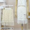 White cotton crochet fringe skirt for women with textured square knit detail and relaxed resortwear silhouette.